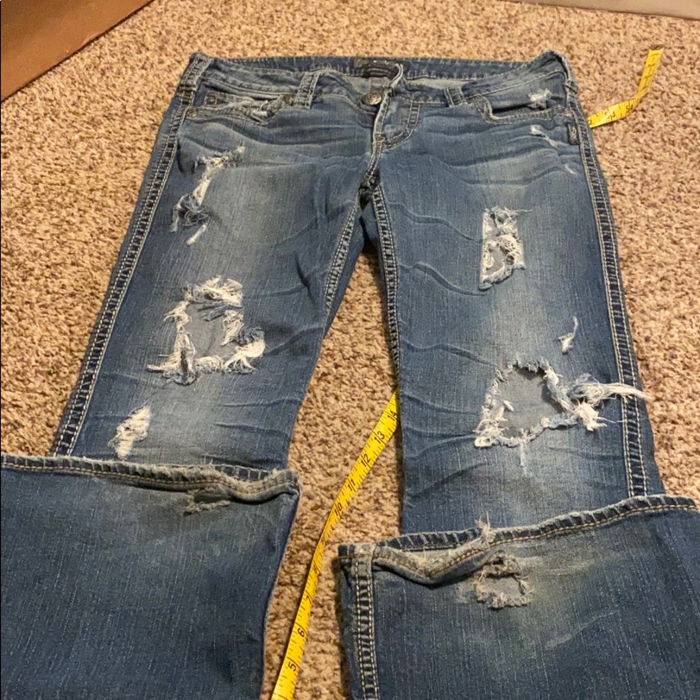 Silver wide leg distressed jeans